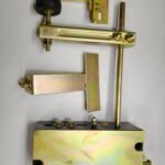 Collapsible door lock with door opening T